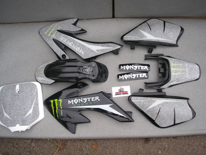 MONSTER GRAPHICS KIT ON BLACK CRF PLASTICS PIT BIKE