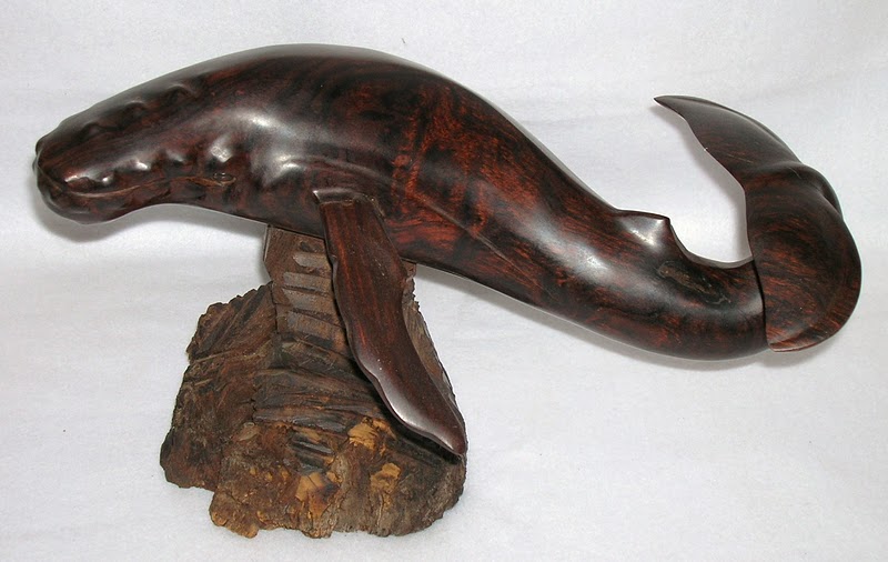 whale tail figurine