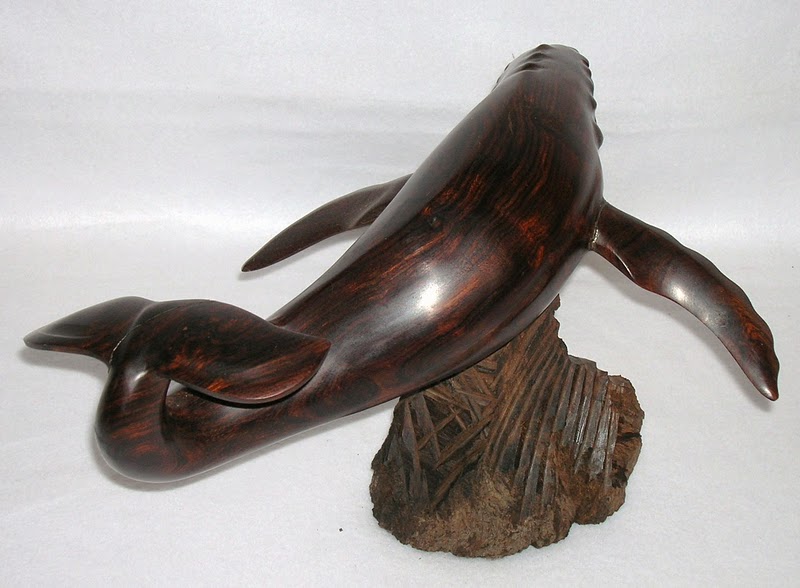 whale tail figurine