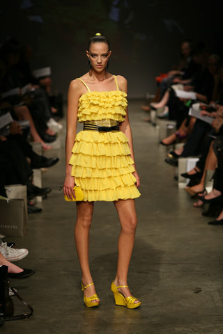 http://imagehost.vendio.com/preview/a/35064000/aview/nicola_finetti_ruffle_yellow_dress1.jpg