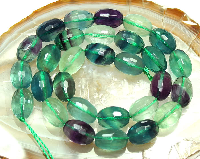 10x15mmFacetedPurpleFluoriteOvalBea.jpg picture by wanglijuan1122