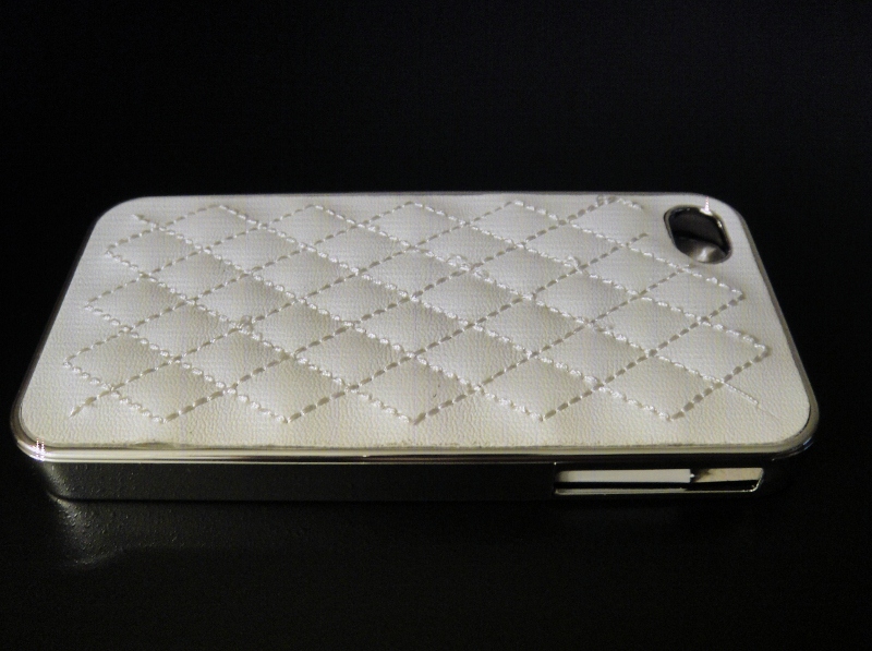 http://imagehost.vendio.com/preview/a/35103879/aview/WhiteLeatherCaseSide2800x597.jpg