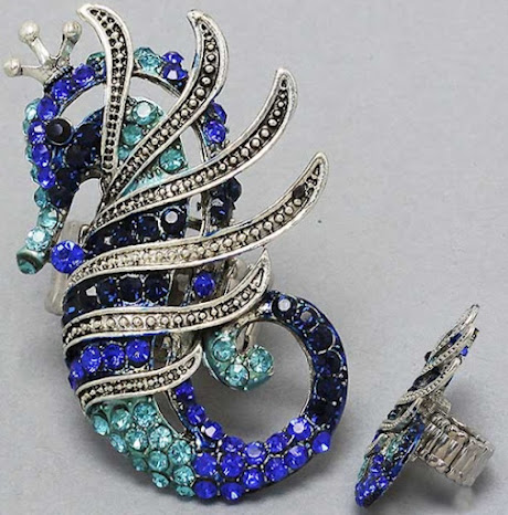 http://imagehost.vendio.com/preview/a/35111061/aview/blue_aqua_seahorse_ring.jpg