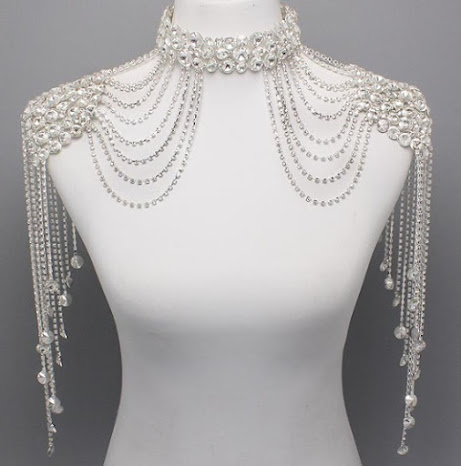 http://imagehost.vendio.com/preview/a/35111061/aview/crystal_shoulder_necklace.jpg