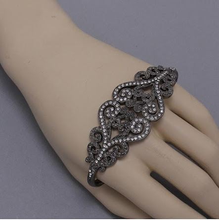 http://imagehost.vendio.com/preview/a/35111061/aview/hand_bracelet_hematite.jpg