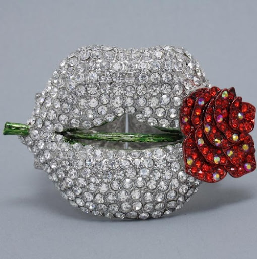 http://imagehost.vendio.com/preview/a/35111061/aview/lips_flower_cuff_1.jpg