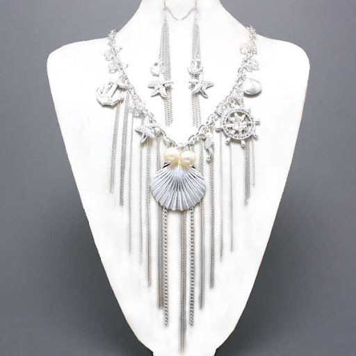 http://imagehost.vendio.com/preview/a/35111061/aview/nautical_252520necklace_252520silver_252520seashell.jpg