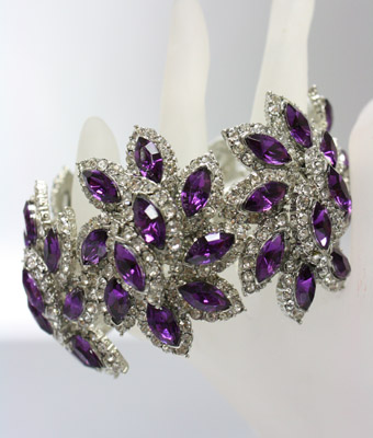 http://imagehost.vendio.com/preview/a/35111061/aview/purple_2520crystal_2520cuff.jpg