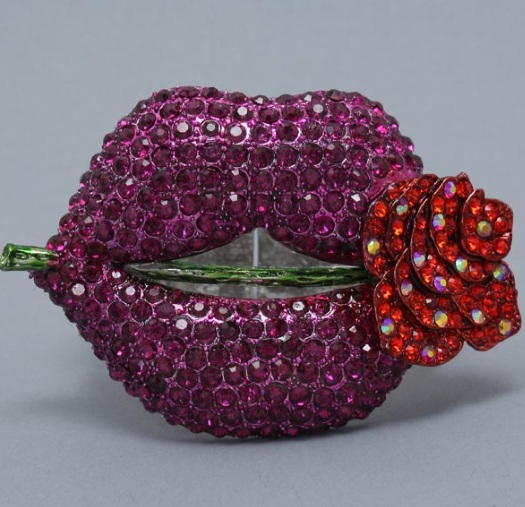 http://imagehost.vendio.com/preview/a/35111061/aview/purple_pink_lips_flower_cuff_1.jpg