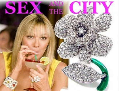 http://imagehost.vendio.com/preview/a/35111061/aview/sex_and_the_city_flower_ring_1.jpg