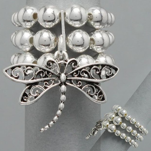 http://imagehost.vendio.com/preview/a/35111061/aview/silver_252520dragonfly_252520ring.jpg