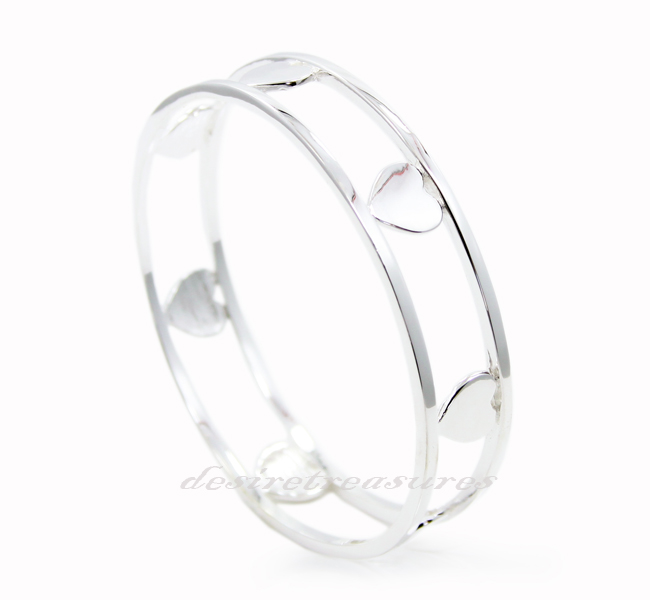 http://imagehost.vendio.com/a/35146771/view/BR0602_7hearts_bangle_01a.jpg