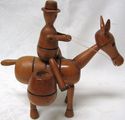 Vintage Toy Carved Turned Wood Man ride on Easel o