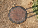 Early 20th Century ebonised milking stool with sta