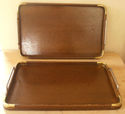 A PAIR OF OAK AND BRASS CORNERED TEA TRAYS POSSIBL