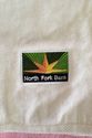 White Golf Ball Tri-fold Towel North Fork Bank Log