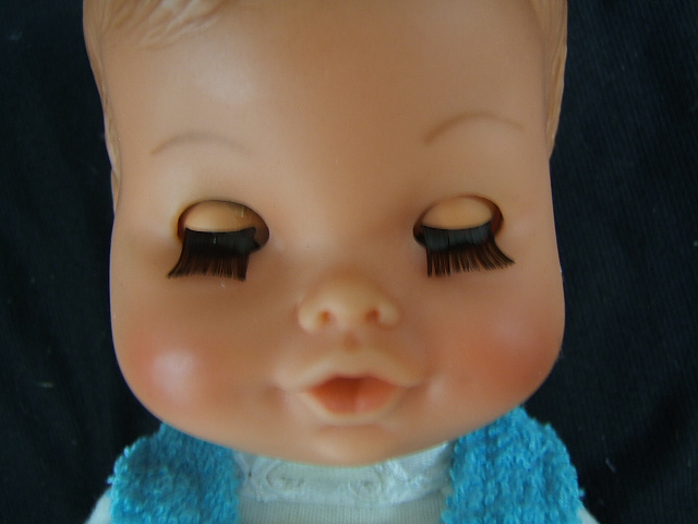 baby doll with closing eyes