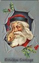 Santa Claus with Finger at Nose Christmas Postcard