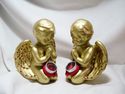 BEAUTIFUL PAIR OF 18 KT GOLD PAINTED CHERUB RELIQU