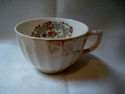 VINTAGE UNMARKED COFFEE/TEA CUP BEIGE WITH GOLD PA
