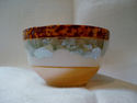 UNMARKED LUSTERWARE CUP WITH HOUSE AND PALM TREE D