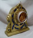 18 KT GOLD PAINTED RESIN RELIQUARY WITH BLUE RHINE