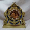 18 KT GOLD PAINTED RESIN RELIQUARY WITH BLUE RHINE