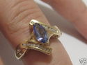 FINE 1.25 CT MARQUISE TANZANITE AND DIAMOND RING 1