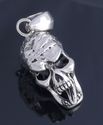 STAINLESS STEEL MOVING TOUNGE SKULL OUTLAW MUSIC P
