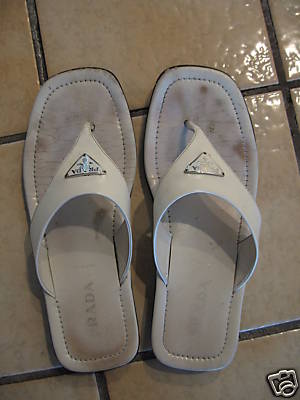 well worn used womens slippers