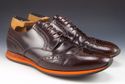 PRADA sz 9.5 PATENT LEATHER WINGTIP SNEAKERS 2EE11