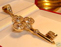 Vintage 10K Yellow Gold Cubic Zirconia Key Pendant