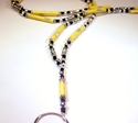 Yellow Paper Beads With Stars Silver Tone Badge / 