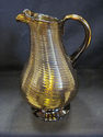 Amber Colored Blown Glass Pitcher - Stripped Desig