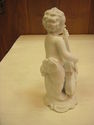 Set of Four Bisque Cherub Figurines with Instrumen