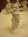 Set of Four Bisque Cherub Figurines with Instrumen