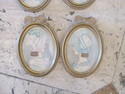 Set of Four Antique Gold Oval Frames with Prints