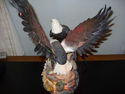 Lighted American Eagle feeding baby statue