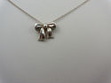 TIFFANY & Co Famous Bow Sterling Silver Pendant Ne