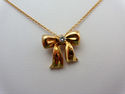 TIFFANY & Co. Famous 18K Gold Diamond Bow Necklace