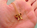 TIFFANY & Co. Famous 18K Gold Diamond Bow Necklace