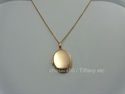 TIFFANY & Co. 585 / 14K Gold Oval Locket Pendant 