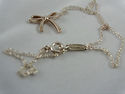 TIFFANY & Co. Ribbon Bow Pendant Necklace 16" Ster