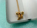 TIFFANY & Co. Famous 18K Gold Diamond Bow Necklace