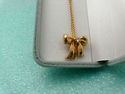 TIFFANY & Co. Famous 18K Gold Diamond Bow Necklace