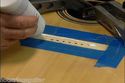 Repairing the lifted guitar bridge luthier  video 