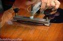 Repairing the lifted guitar bridge luthier  video 