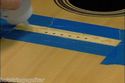 Repairing the lifted guitar bridge luthier  video 