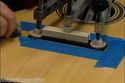 Repairing the lifted guitar bridge luthier  video 