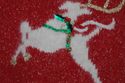 Villager white reindeer on red mock turtle sweater